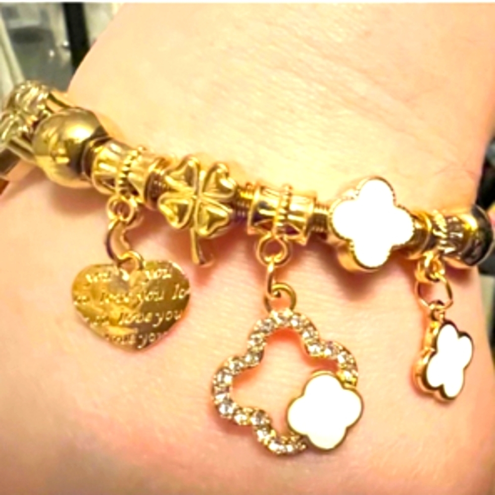 Elegant Gold and White Charm Bracelet
